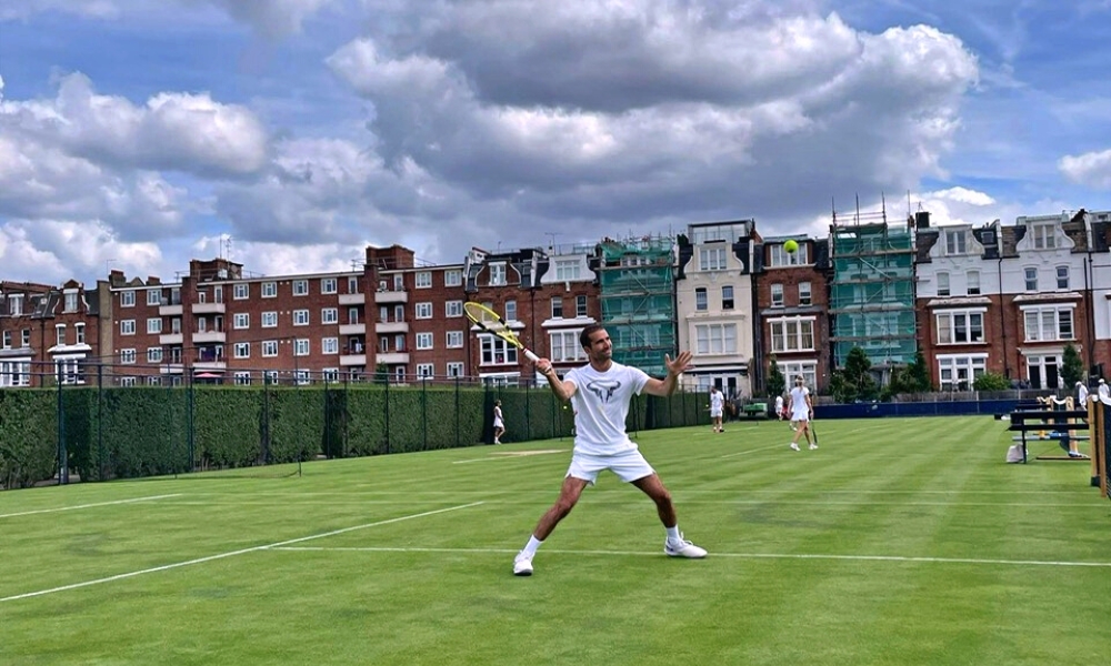 Andres Hurwitz, playing tennis at the grass court